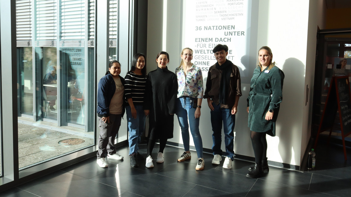 Gruppenbild internationaler Mitarbeiter:innen